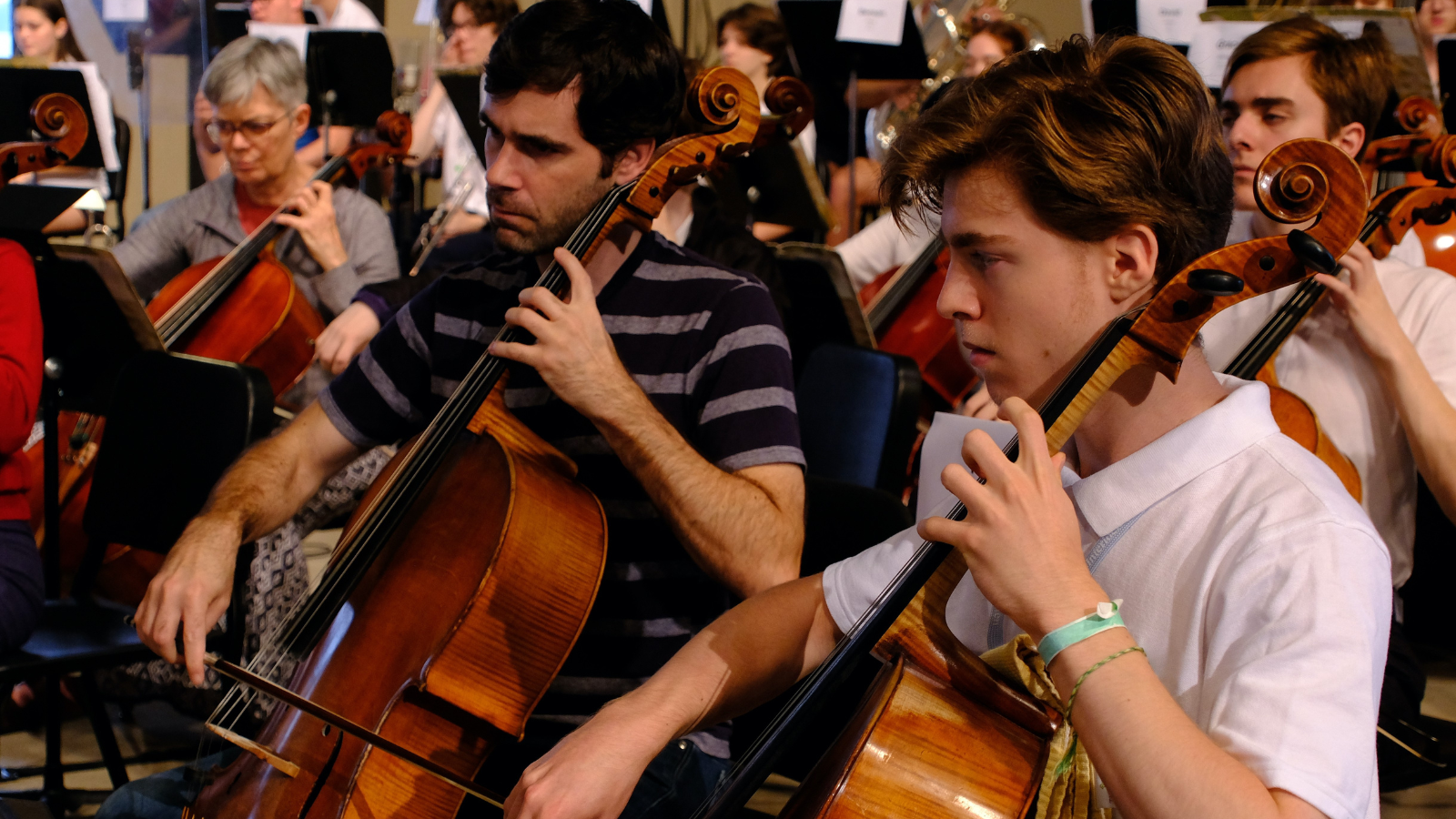 An orchestra playing in rehearsal