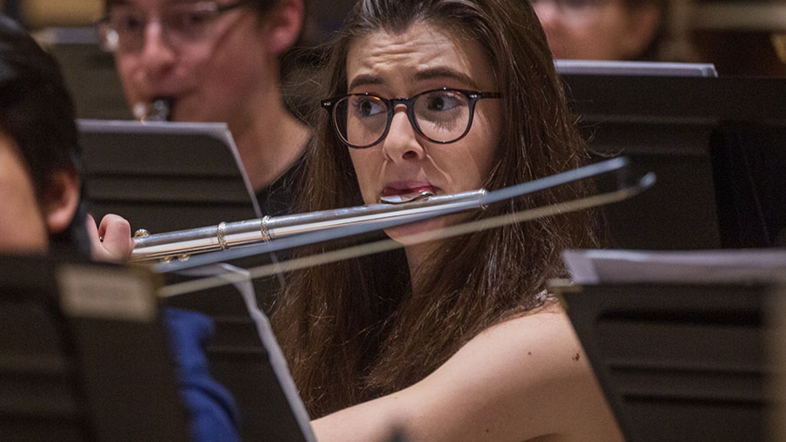 A girl playing the flute