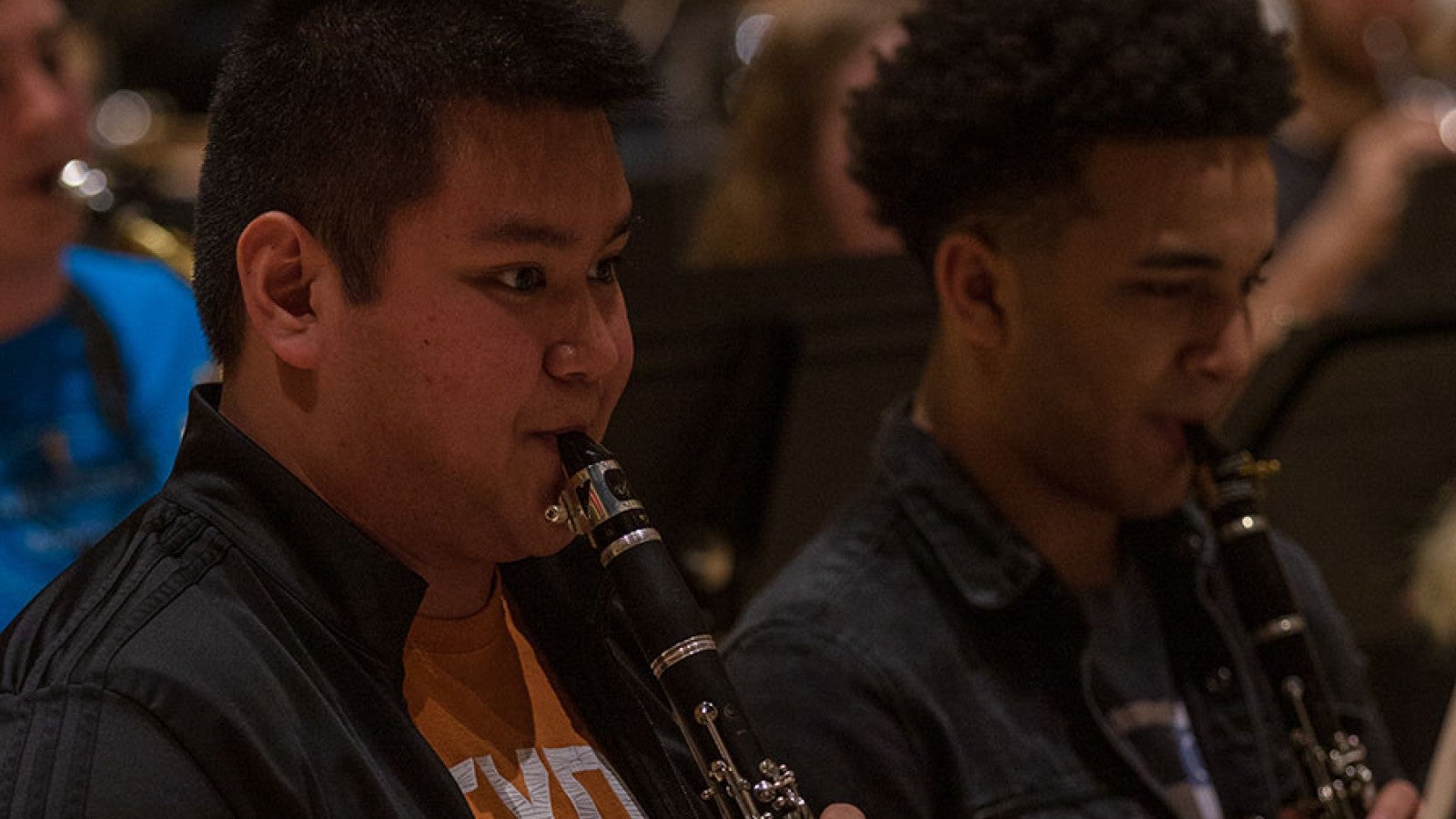 A boy playing the clarinet