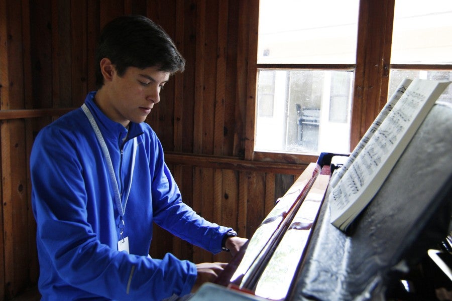 Piano Intensive student playing in practice hut at Interlochen Arts Camp