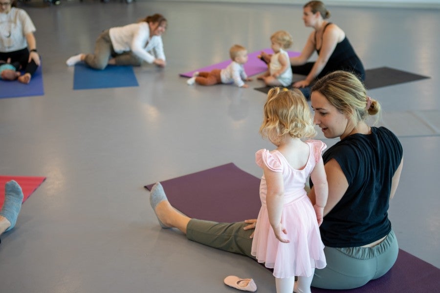 Parents and children in a dance studio