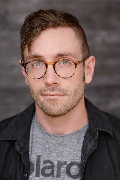 Professional headshot of Kit Williamson