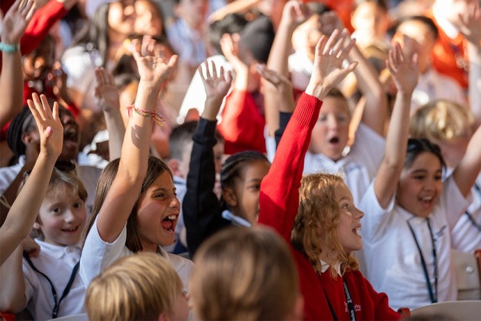 Junior students cheer during First Gathering.