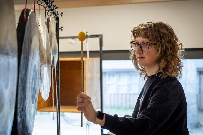 An Interlochen Arts Academy percussion student rehearses with the school’s Percussion Ensemble.