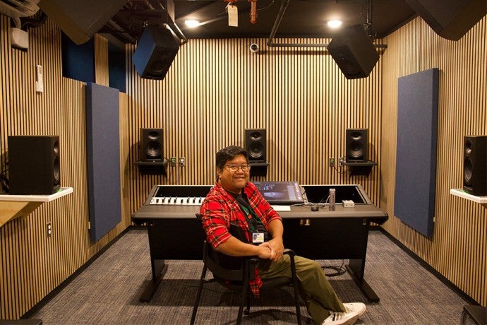 Marc Lacuesta sits at the interface in the Dolby Atmos room