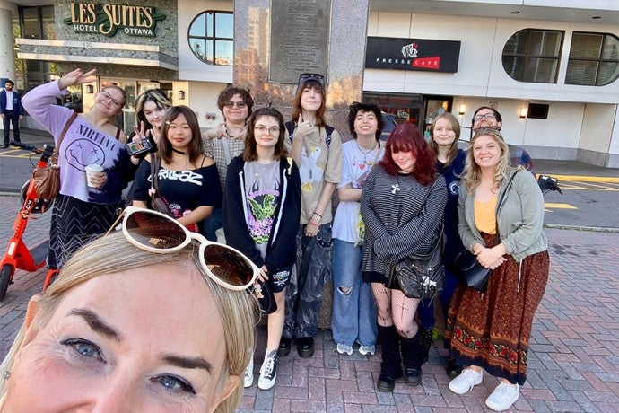 Director of Animation Briana Yarhouse takes a selfie with students in Ottawa, Canada.