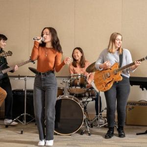 Singer-songwriters rehearse in the Music Center