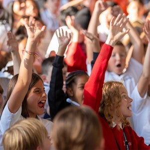 Junior students cheer during First Gathering.