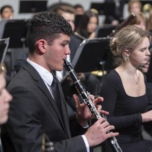 Interlochen Arts Academy student play clarinet during a Wind Symphony concert.