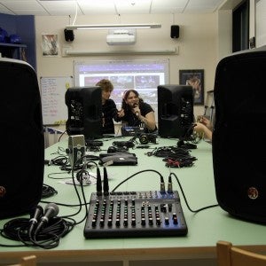 Students work with professional-grade sound design equipment, including top-of-the-line speakers and DAWs.