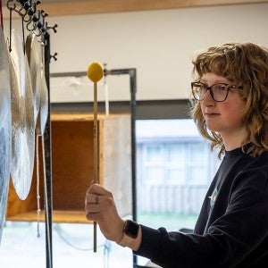 An Interlochen Arts Academy percussion student rehearses with the school’s Percussion Ensemble.