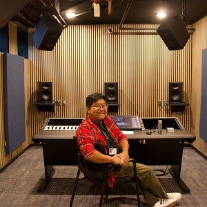 Marc Lacuesta sits at the interface in the Dolby Atmos room