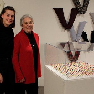 Donor Joanne Sprouse with one of the recipients of the scholarship she created at an event in the Visual Arts gallery.